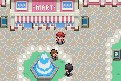 Standing by a Mart and a fountain in a town square