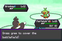 A double battle between the player's Farfetch'd and Grookey and an opponent's Rookidee, with the message "Grass grew to cover the battlefield!"