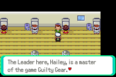 A gym interior with rows of trainers on a wooden floor and a textbox describing the leader