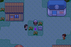 Walking between two houses and a Pokémon Centre at dusk