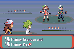 A double battle against two trainers on a grassy field