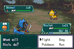 A battle against a wild Shinx, with the player's own Riolu sent out