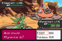 A battle between two Mega-evolved Pokémon on a rocky field