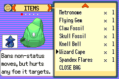 The bag open on a Wizard Cape, described as banning non-status moves but hurting any foe it targets