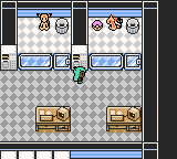 A Pokémon Storage System room with two computer terminals and wooden crates