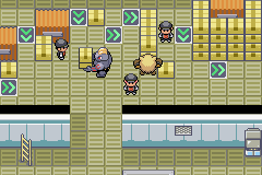 A subway platform scene with Team Rocket grunts and an explosion effect