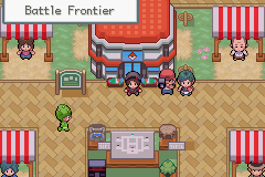 An overhead view of the Battle Frontier building with market stalls and several characters standing outside