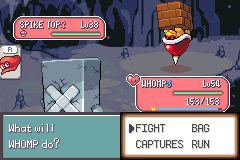 A battle in a cave: the player's Whomp at level 50 faces a wild Spike Top at level 38