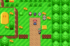 Mario walking up a grassy path in World 1-1 past Toads, item blocks and a green warp pipe
