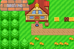 Mario outside his red-roofed house at Mario's Pad, with a Power Star on the roof