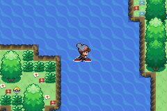 Surfing across open water on a Pokémon's back, with wooded banks either side